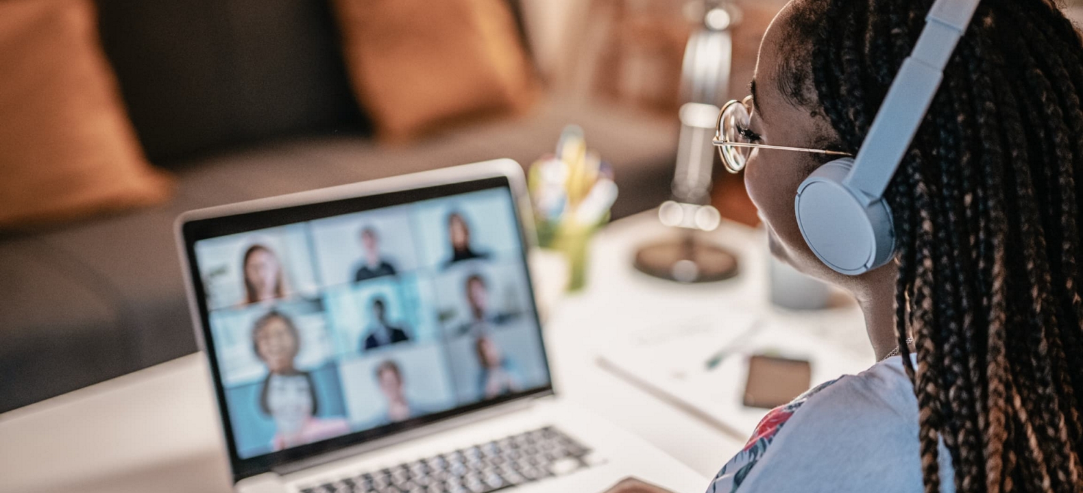 A student uses her connected laptop to collaborate with peers in an online learning environment.